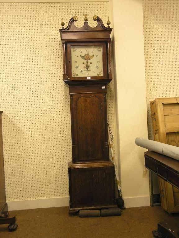 Appraisal: An early th century oak and mahogany eight day longcase