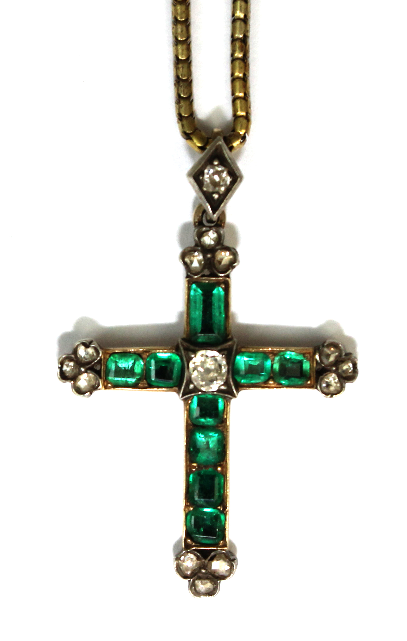 Appraisal: A diamond and emerald set pendant cross mounted with a