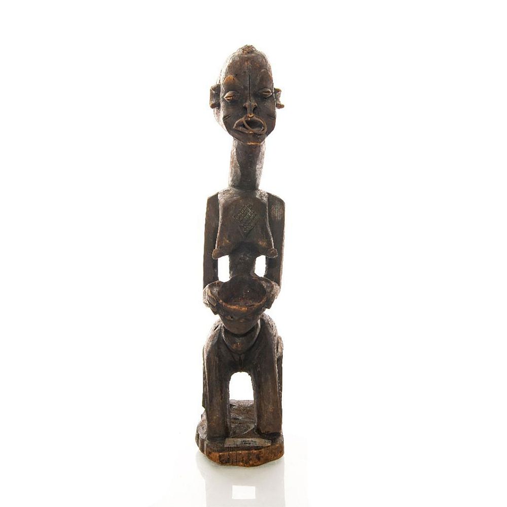 Appraisal: WOODEN SCULPTURE FROM ZAIRE OF WOMAN AND MOLTAR Hand carved