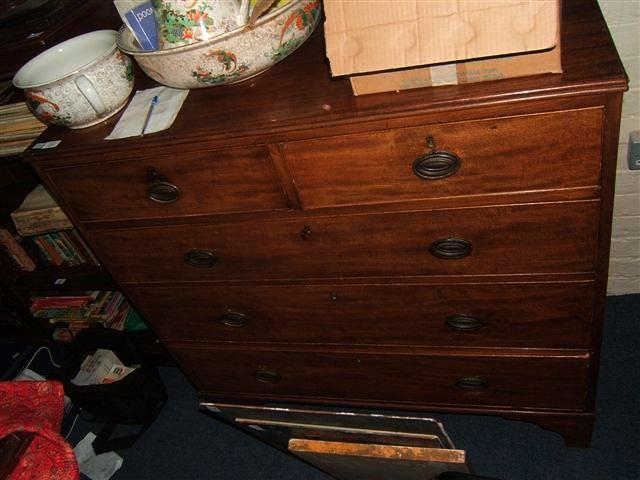 Appraisal: A th Century mahogany chest of two short and three