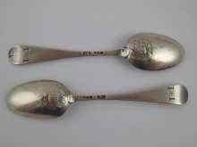 Appraisal: A pair of Hanoverian Chinese Mask picture back teaspoons maker