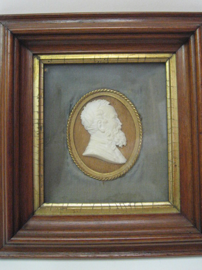 Appraisal: A Carved Relief Bust Silhouette of a gentleman with beard