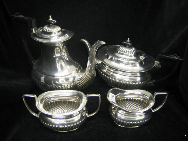 Appraisal: Sheffield Silverplate Tea Coffee Service ribbed decor ebony handles pc