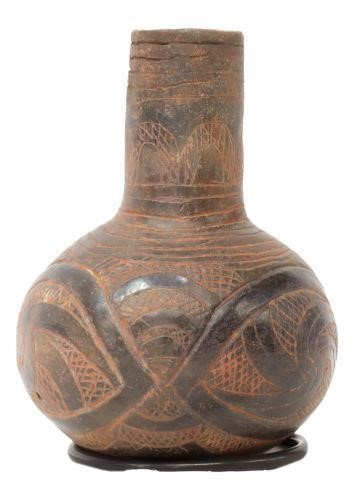 Appraisal: Native American redware bottle with later engraving approx h diam