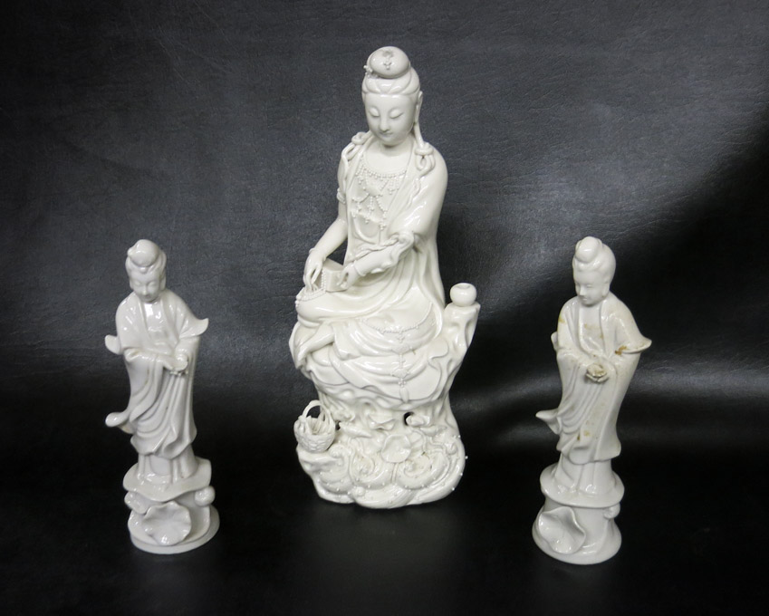 Appraisal: THREE CHINESE BLANC DE CHINE PORCELAIN GUANYIN FIGURINES each Guanyin