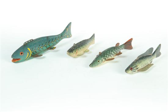 Appraisal: FOUR FISH DECOYS American st half- th century Carved wood