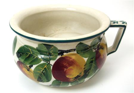 Appraisal: WEMYSS CHAMBER POT EARLY TH CENTURY decorated with apples painted