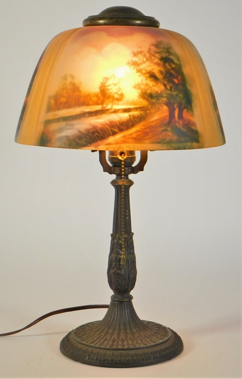 Appraisal: COUNTRY SCENE REVERSE PAINTED BOUDOIR LAMP United States Early th