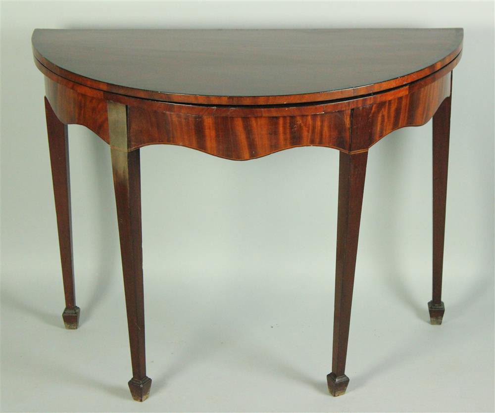 Appraisal: GEORGE III MAHOGANY INLAID DEMILUNE CARD TABLE having a hinged