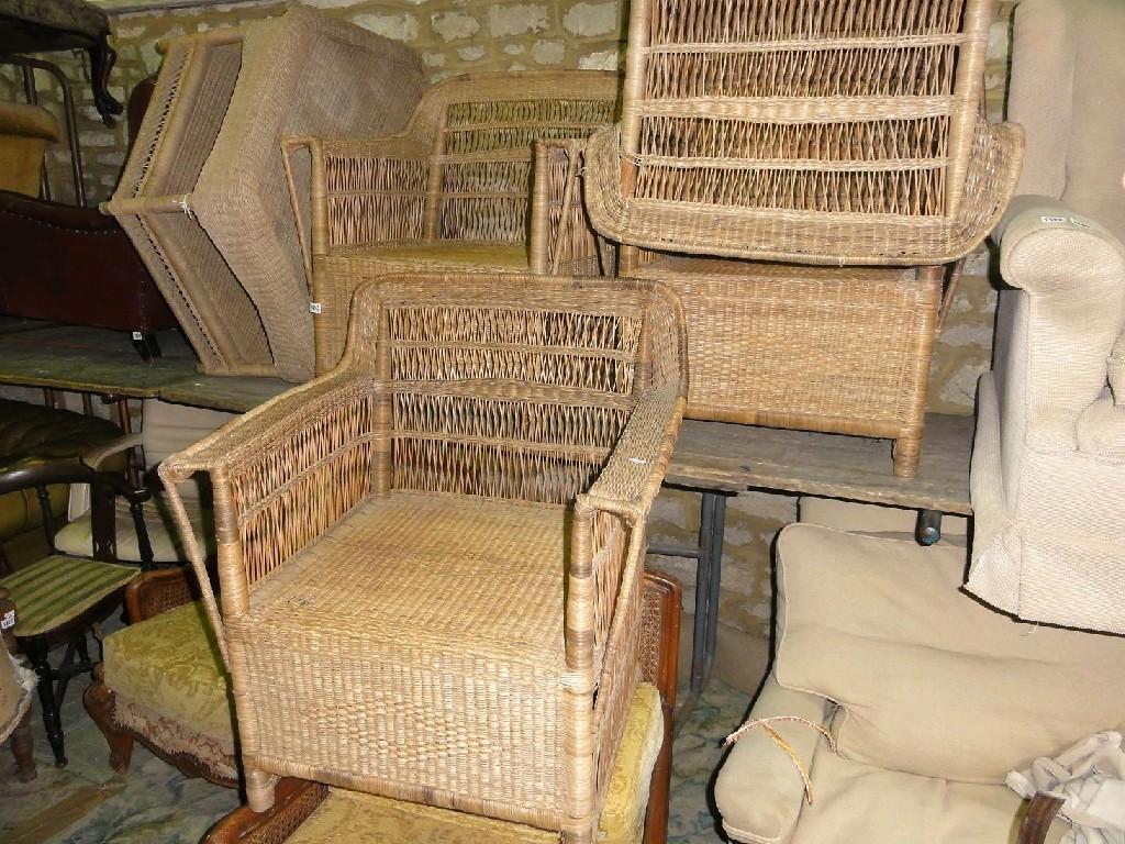 Appraisal: A suite of cane conservatory furniture comprising four elbow chairs