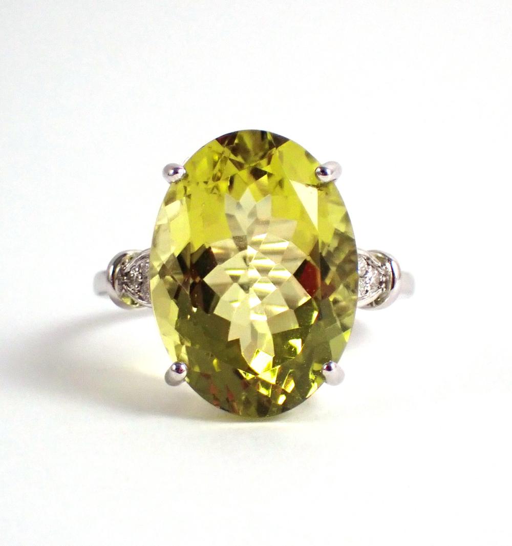 Appraisal: LEMON CITRINE DIAMOND AND FOURTEEN KARAT GOLD RING The k