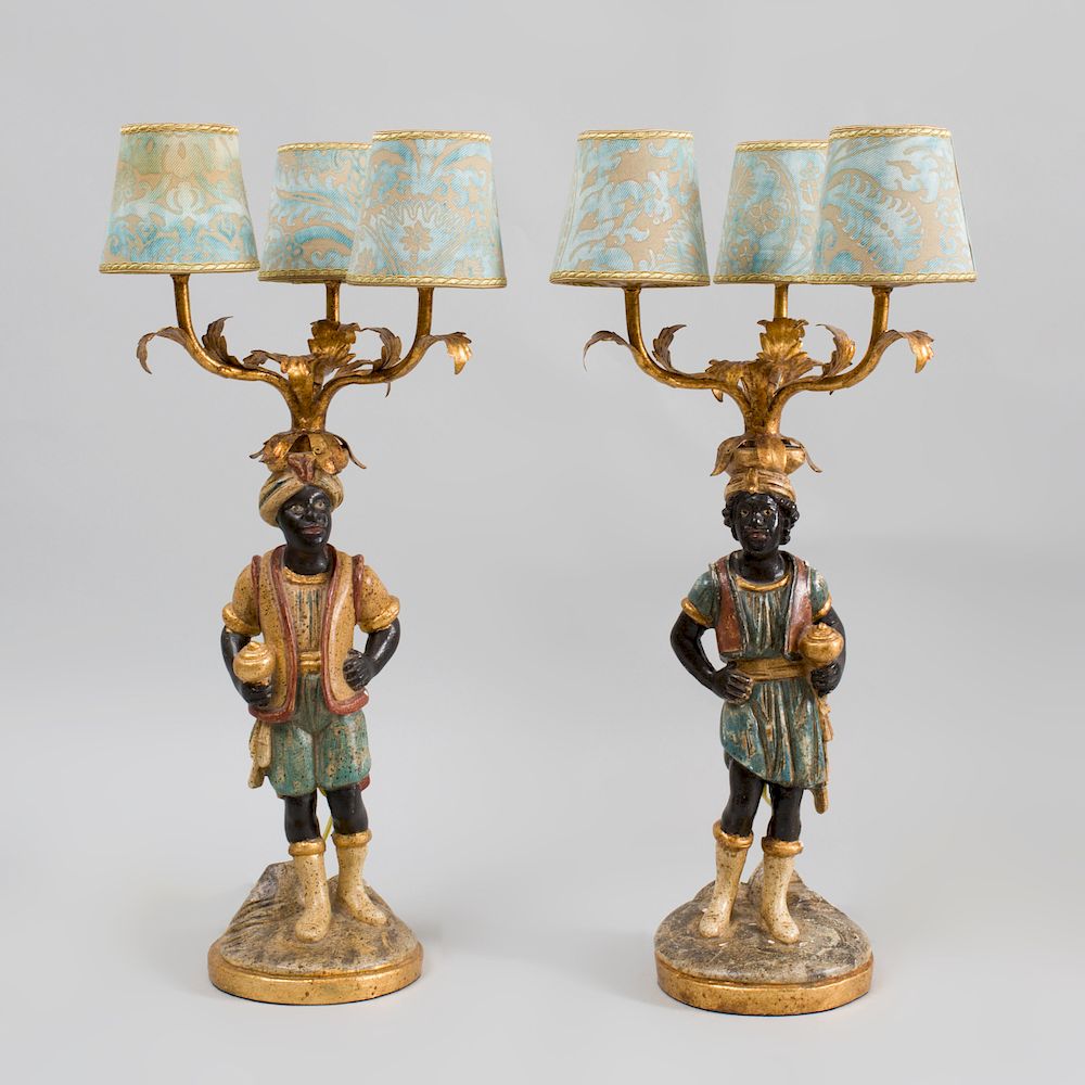 Appraisal: Pair of Italian Rococo Style Carved Painted and Parcel-Gilt Moor