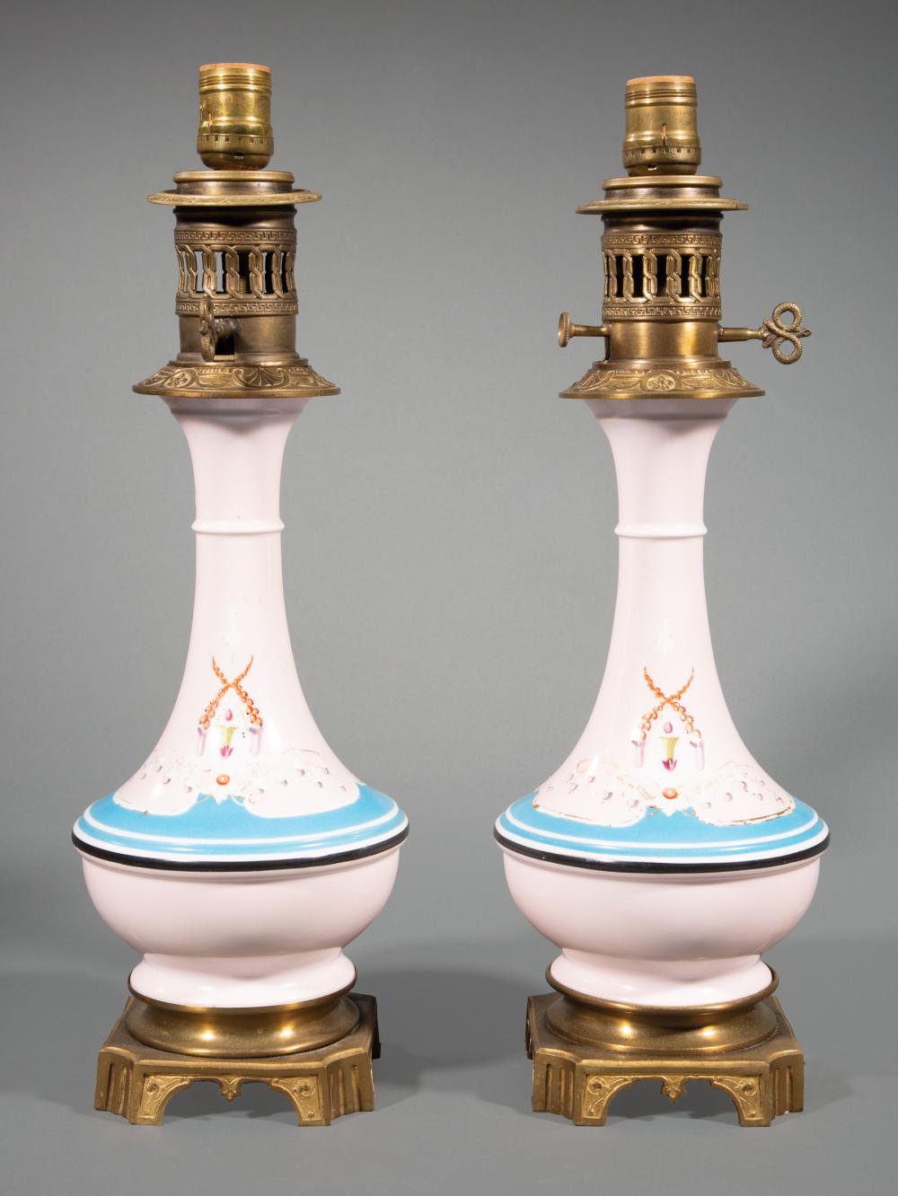 Appraisal: Pair of Paris Polychrome and Gilt Porcelain Carcel Lamps th