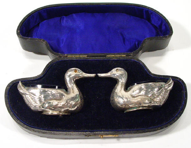 Appraisal: Pair of Edwardian Silver duck shaped novelty salts with blue