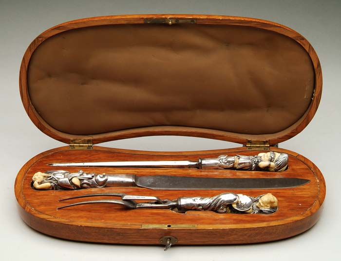 Appraisal: OUTSTANDING CASED SILVER AND IVORY CARVING SET Three piece carving