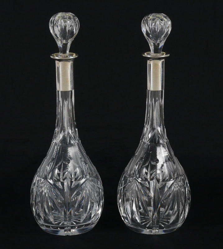 Appraisal: PAIR GERMAN SILVER MOUNTED CUT GLASS DECANTERS Illegible German makers