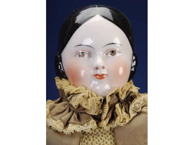 Appraisal: Brown Eyed China with Covered Wagon Hairstyle Germany ca a