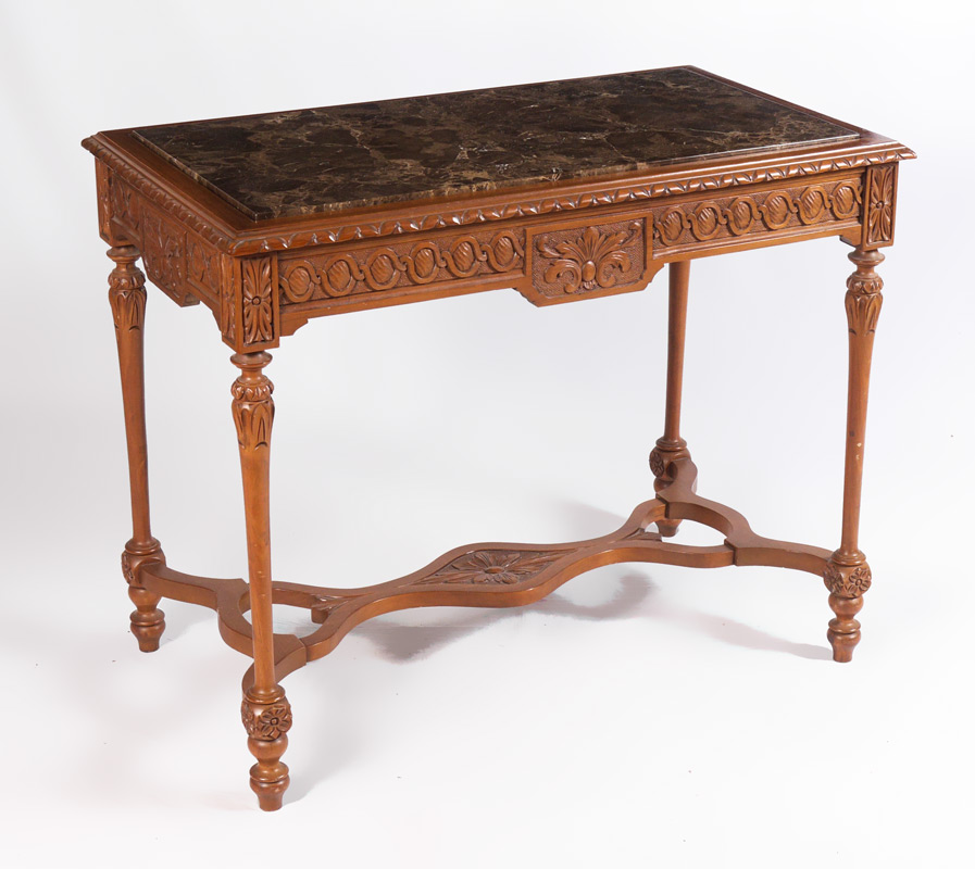 Appraisal: VICTORIAN CARVED MARBLE TOP TABLE Inset marble top carved trim