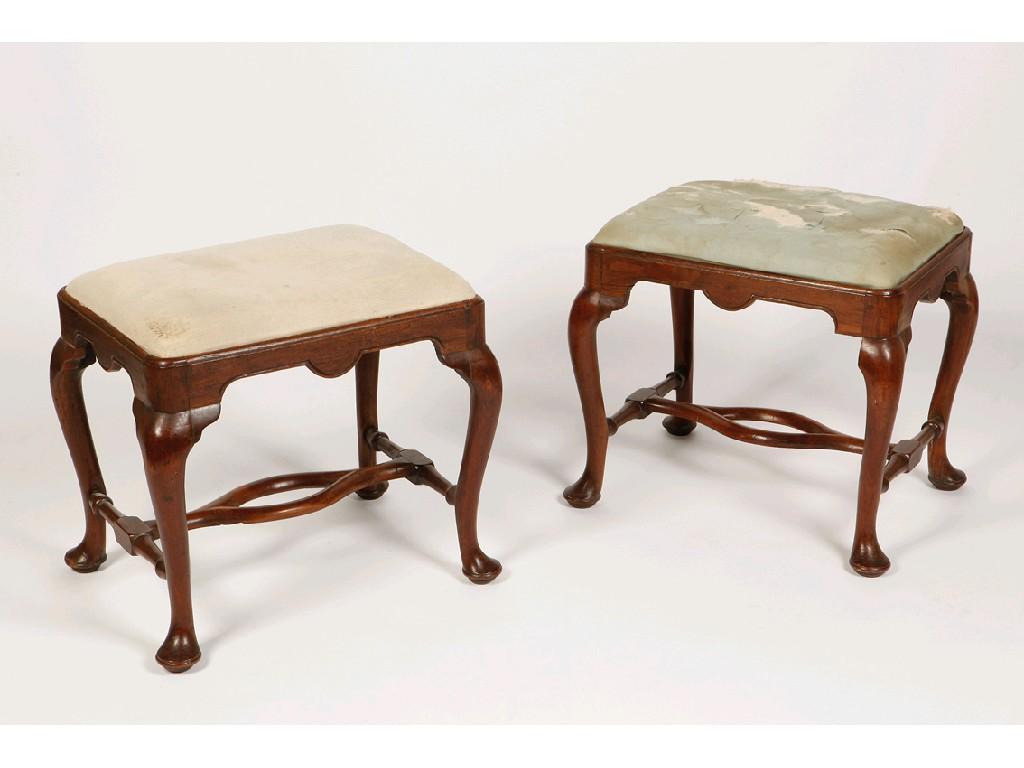 Appraisal: A PAIR OF GEORGE II WALNUT STOOLS the rectangular tops