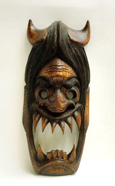 Appraisal: CARVED WOOD TRIBAL MASK with sloped face large open mouth