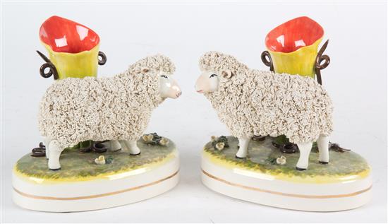 Appraisal: Sale Lot A Pair of Ceramic Spill Vases having sheep