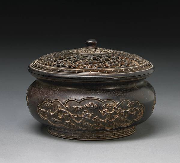 Appraisal: A carved zitan bowl and reticulated cover th Century The