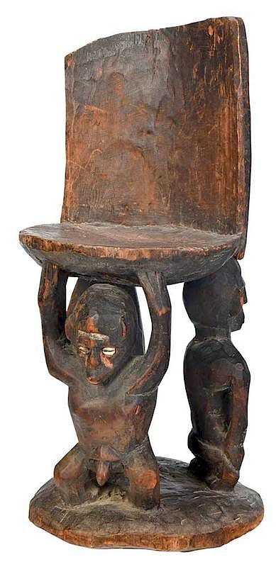 Appraisal: Indonesian Chief's Chair early th century round base seat supported