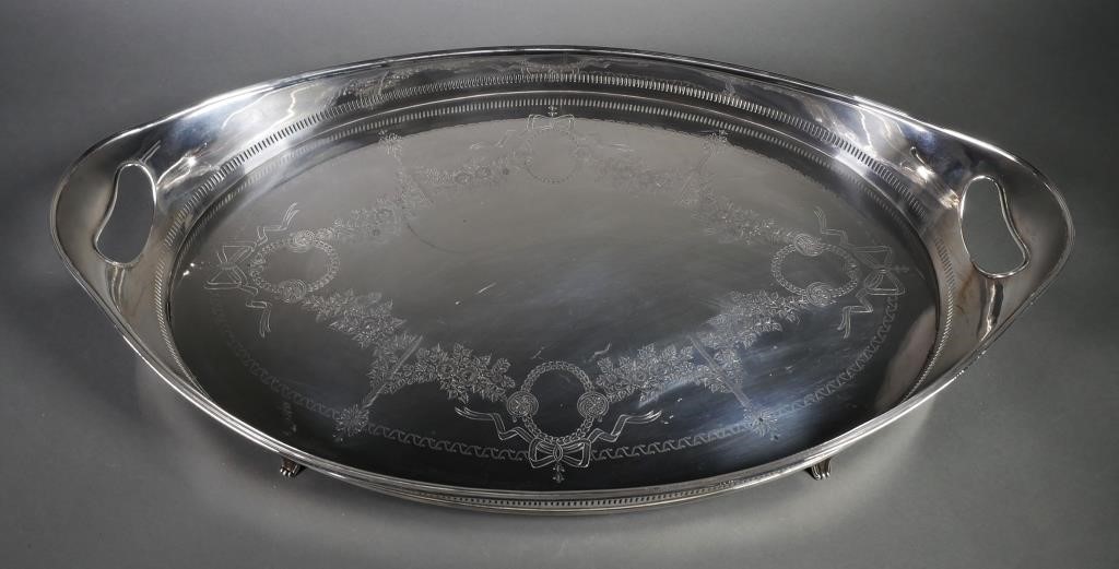 Appraisal: English sterling silver footed tea and coffee service tray bearing