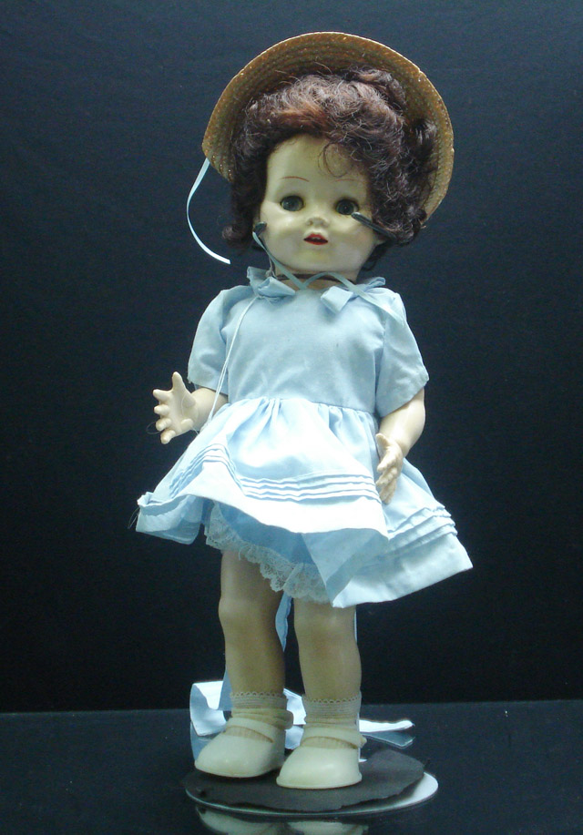 Appraisal: A Pedigree Walker doll all original in blue polka dot