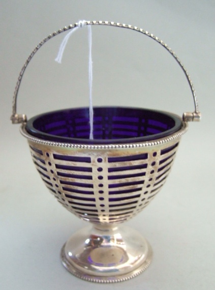 Appraisal: A silver sugar basket the body with pierced decoration with