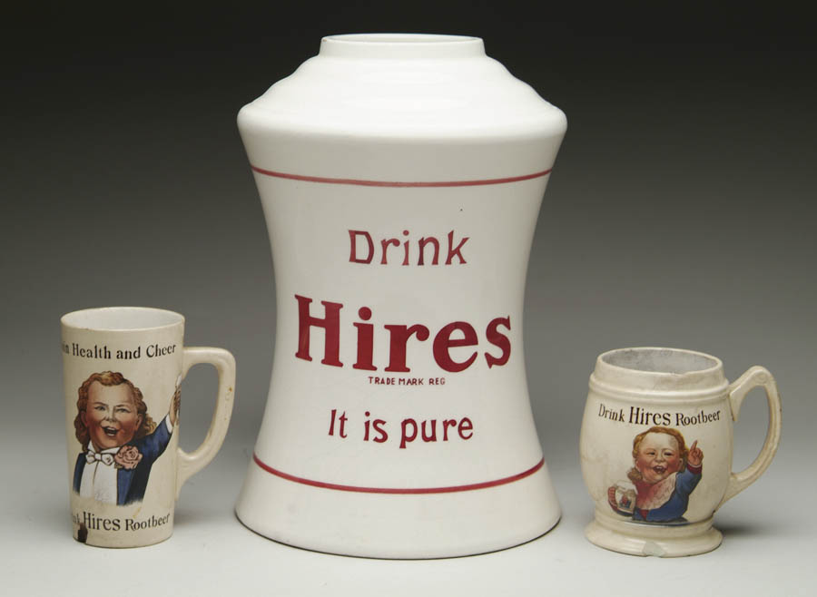 Appraisal: HIRES ROOT BEER SYRUP DISPENSER AND MUGS Hires hourglass ceramic