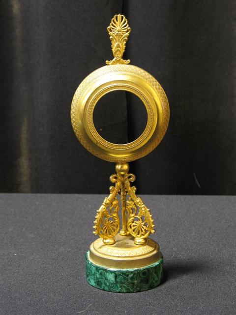 Appraisal: SMALL GILT-BRONZE WATCH STAND Nineteenth century delicately cast with deep