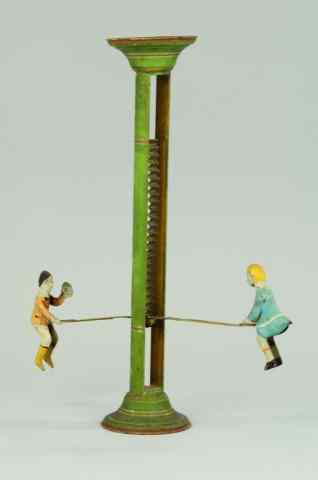 Appraisal: GIBBS SEE-SAW TOY Popular tin lithographed toy boy and girl