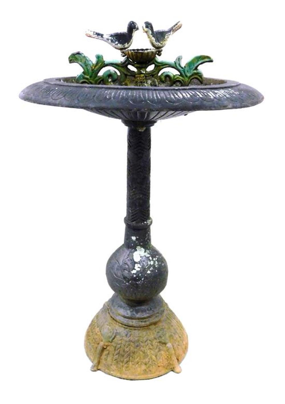 Appraisal: GARDEN Birdbath cast iron round concave top with movable bird