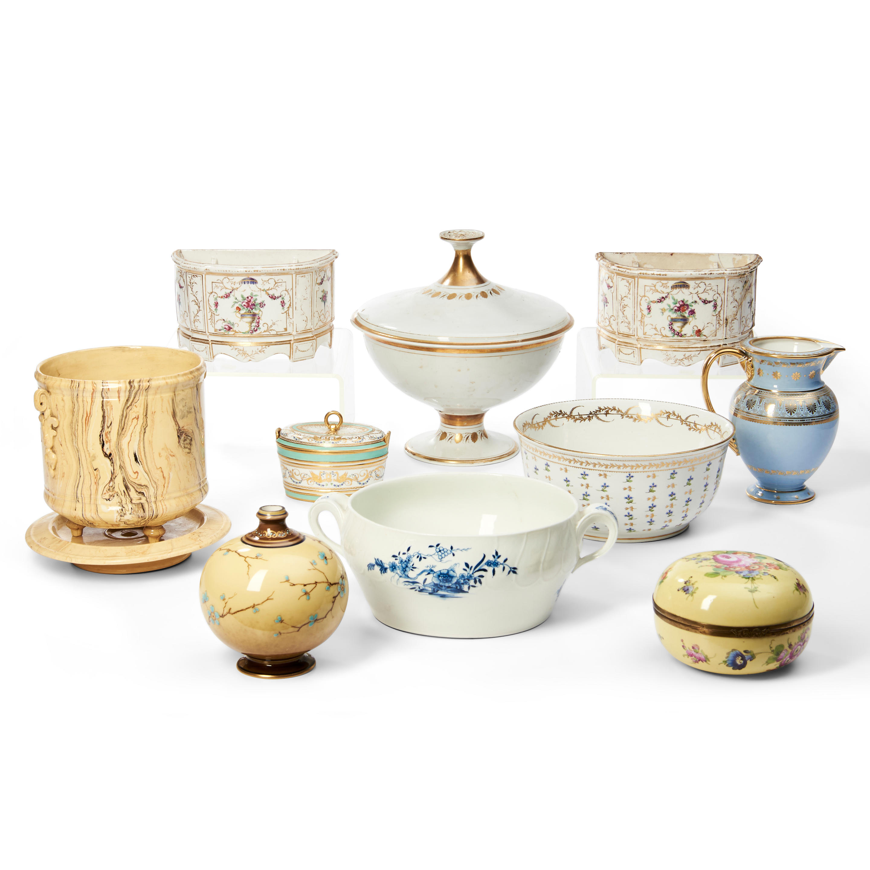 Appraisal: TEN PIECES OF CONTINENTAL PORCELAIN TABLEWARE including an agate-glazed jardini