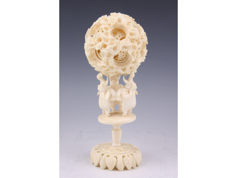 Appraisal: Ornate Chinese Ivory Puzzle Ball nine intricately carved free-floating hollow