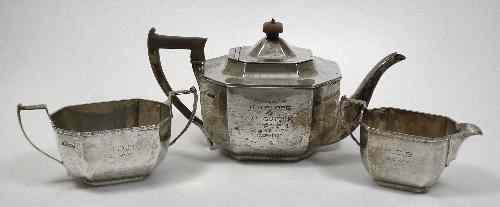 Appraisal: A George V silver three piece tea service of octagonal