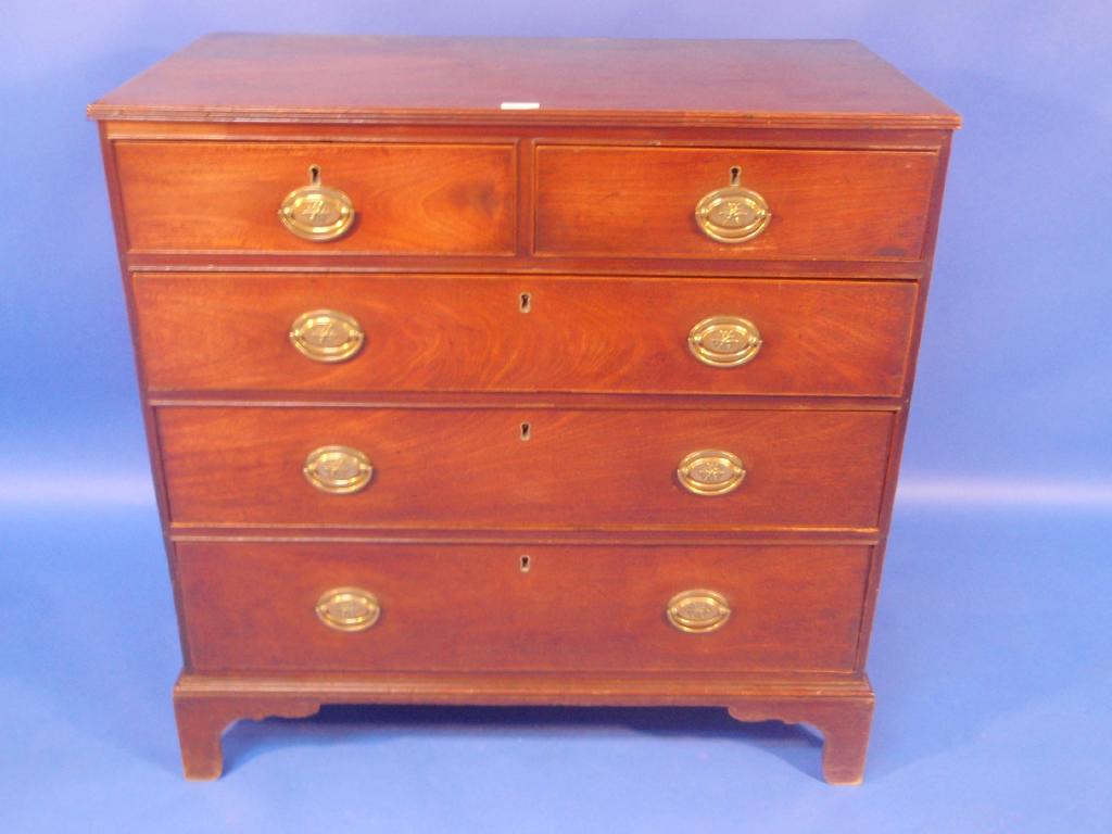 Appraisal: A George III chevron banded chest of two short and