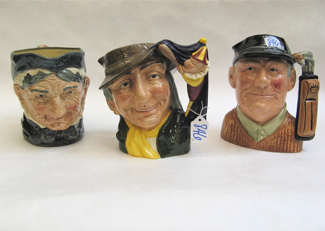 Appraisal: THREE ROYAL DOULTON LARGE TOBY JUGS Punch Judy Man D