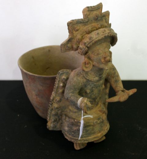 Appraisal: A terracotta drinking vessel in the pre-Colombian style with a