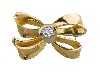 Appraisal: A DIAMOND BOW BROOCH with single claw set round brilliant