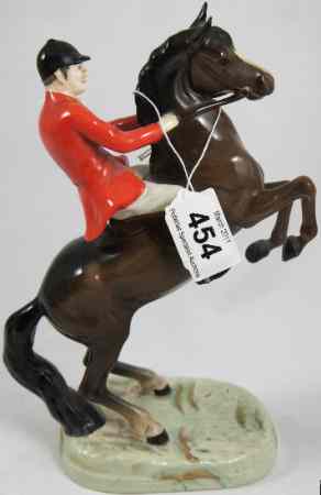 Appraisal: Beswick Model of a Huntsman on Rearing Horse