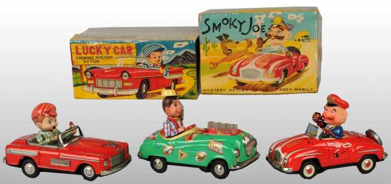 Appraisal: Lot of Tin Automobile Battery-Operated Toys Description Japanese Working Includes