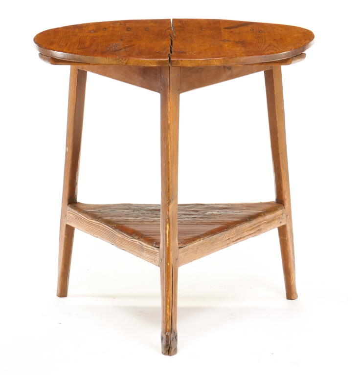 Appraisal: AMERICAN CRICKET TABLE Mid th century pine Single board top