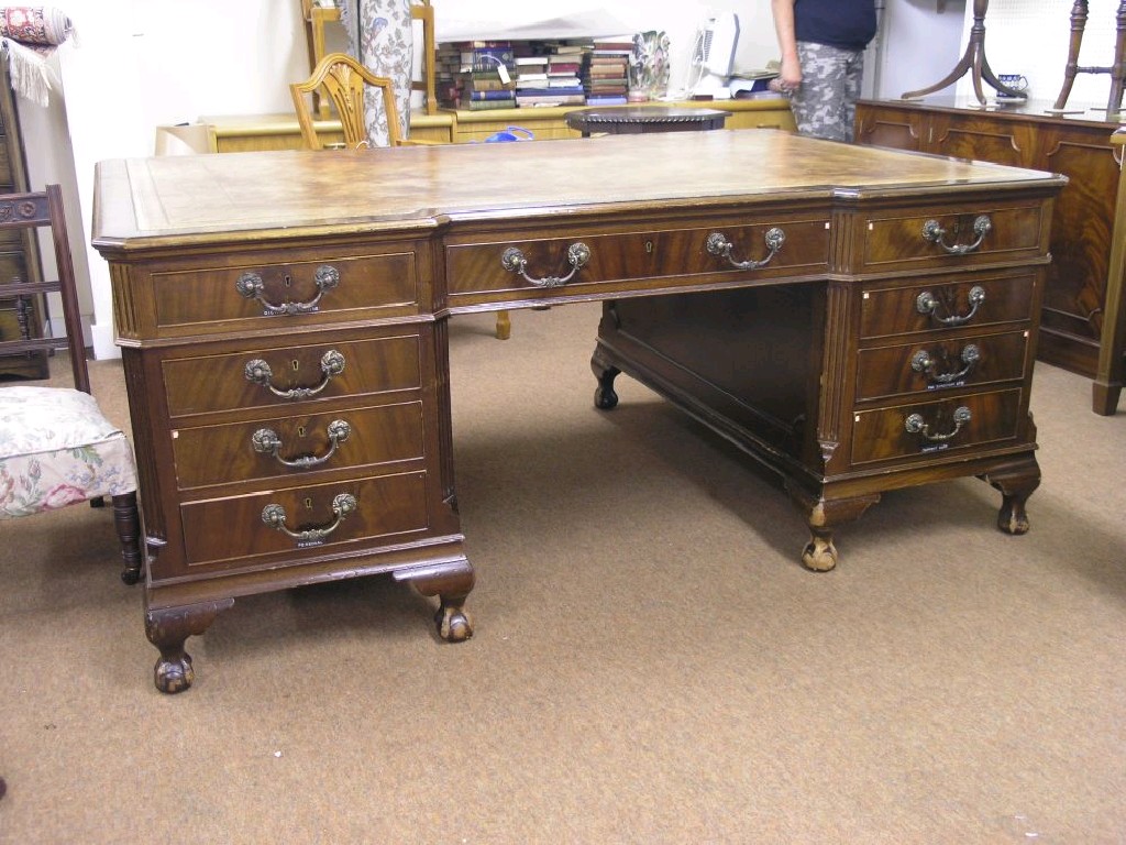 Appraisal: A Hobbs Co mahogany partner's desk with inset gilt-tooled brown