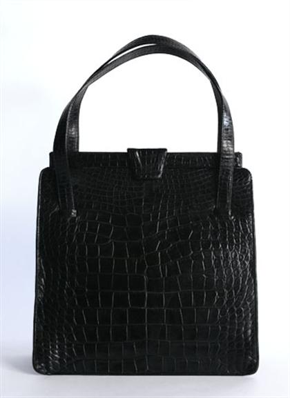 Appraisal: Nettie Rosenstein black alligator handbag s Large structured bag with