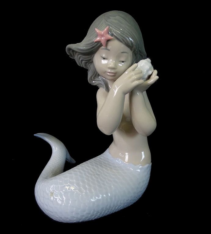 Appraisal: NAO by Lladro Sounds of the Sea Porcelain NAO by