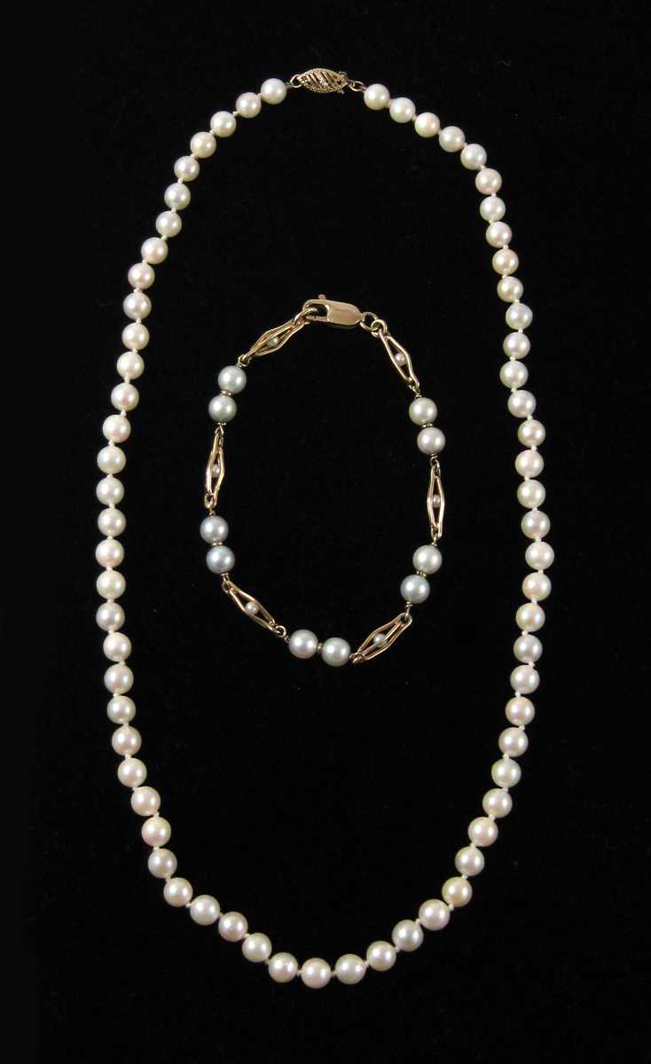 Appraisal: TWO ARTICLES OF WHITE PEARL JEWELRY including an - inch