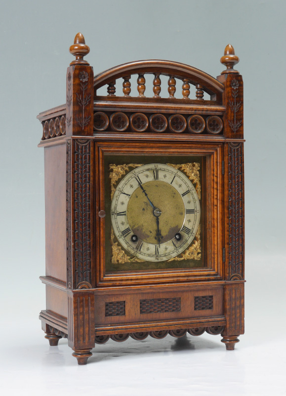 Appraisal: WINTERHALDER HOFMEIER CARVED MANTLE CLOCK Mahogany case with carved architectural