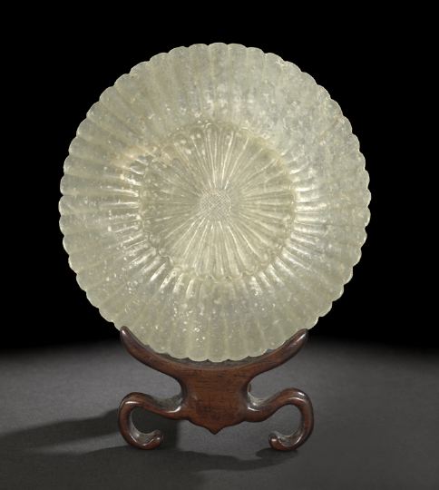 Appraisal: Chinese Carved Jade Chrysanthemum Disk the pale green celadon-colored stone